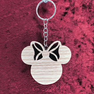 Voici un joli porte-clés de la tête Minnie de Disney en bois noble