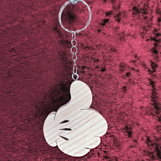 Voici un joli porte-clés de la main de mickey en bois noble