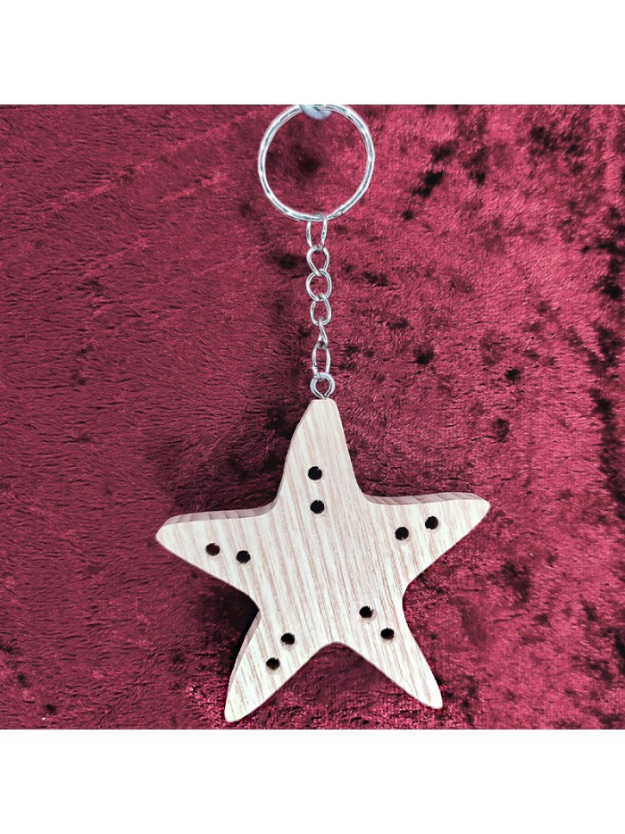 Voici un joli porte-clés d’une magnifique étoile de mer en bois noble