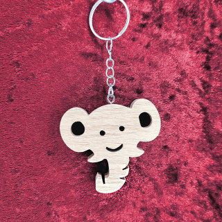 joli porte-clés d’une magnifique tête d'éléphant en bois noble