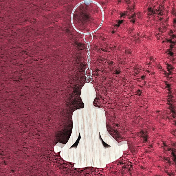 Voici un joli porte-clés zen, relaxation et détente en bois noble