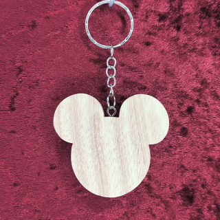 Voici un joli porte-clés de la tête de mickey en bois noble