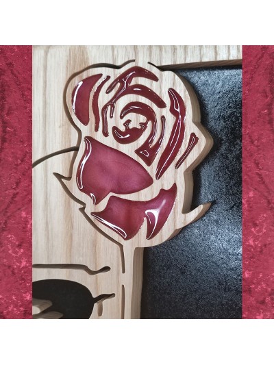 Tableau bois d'un crane avec une rose