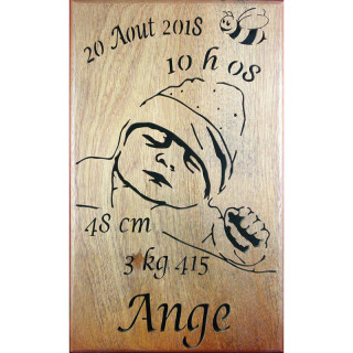 Tableau d'une commande client de cadeau de naissance sur du bois noble