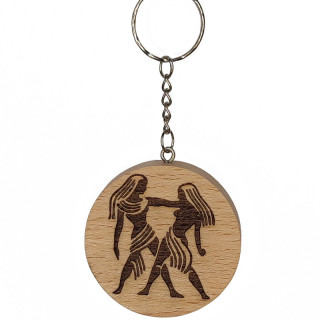 Voici un joli porte-clés du signe astrologique Gemeaux en hêtre