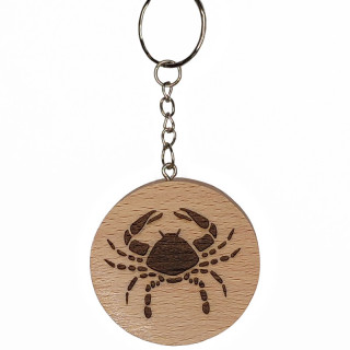 Voici un joli porte-clés du signe astrologique Cancer en hêtre