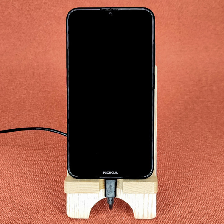 Station d'accueil pour smartphone avec une petite clé de sol