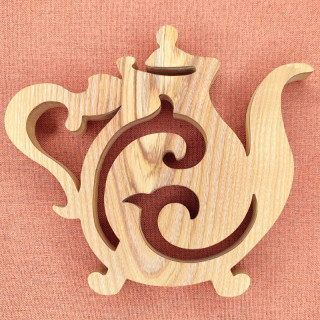 Dessous de plat en bois noble ou vous retrouver une magnifique théière