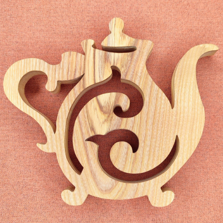 Dessous de plat en bois noble ou vous retrouver une magnifique théière