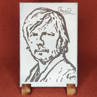 Gravure sur ardoise de la célébrité de Renaud avec la signature
