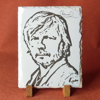 Gravure sur ardoise du célèbre chanteur Renaud avec sa signature