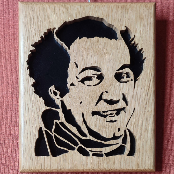 Tableau en bois noble d’une personnalité connu, voila Coluche