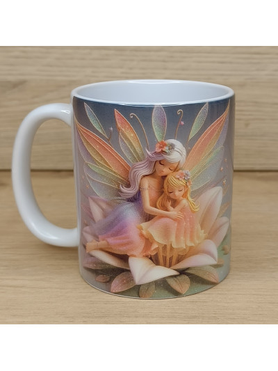 Mug avec deux fées assises...