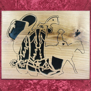 Tableau en bois noble d’un cowboy avec chapeau, colts et santiags