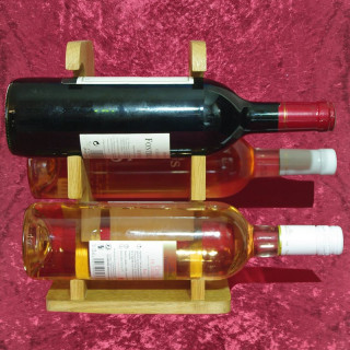 Voici un superbe porte trois bouteilles en frêne ou en chêne