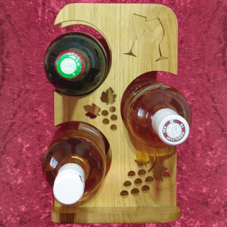 Voici un superbe porte trois bouteilles en frêne ou en chêne