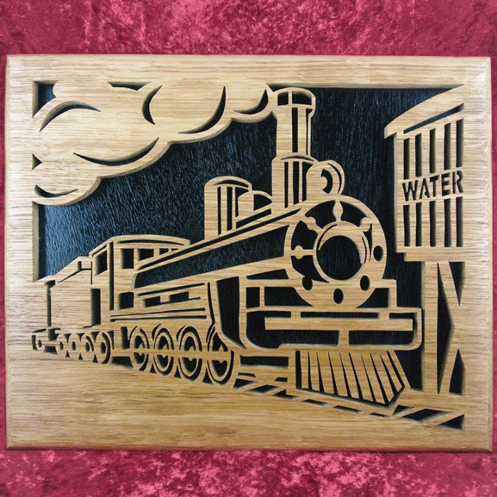 Voici un jolie tableau avec une locomotive à vapeur en bois