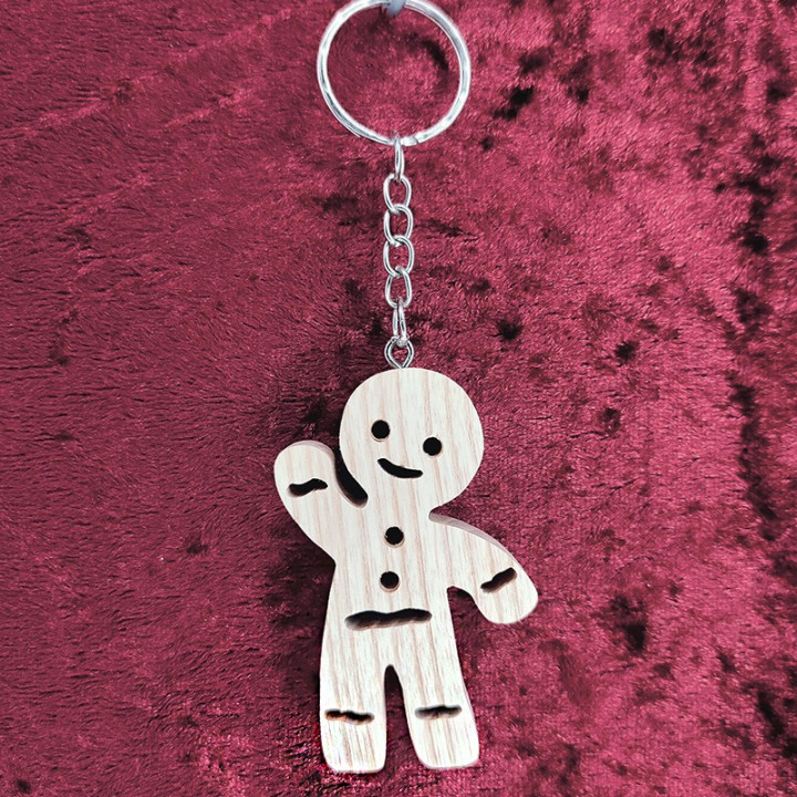 Voici un joli porte-clés d’un bonhomme d'épice en bois noble