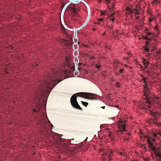 Voici un joli porte-clés d’un loup en bois noble