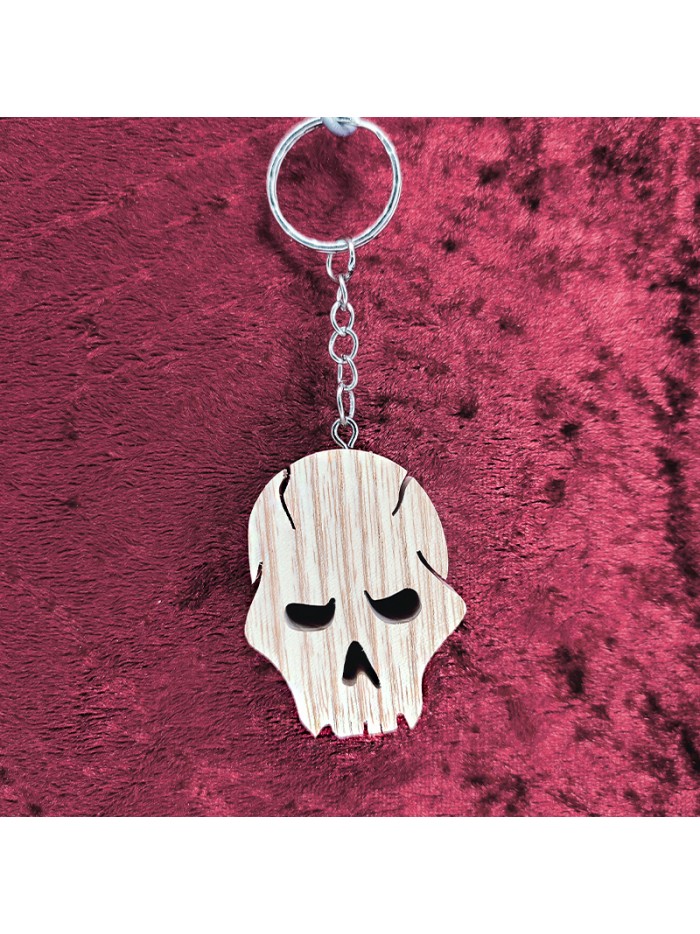 Porte clés bois d'une tête de mort