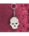 Porte clés bois d'une tête de mort