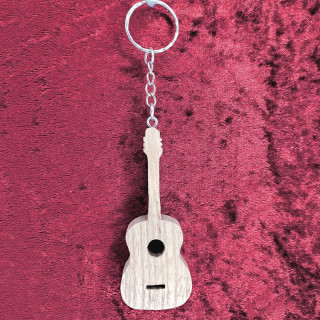 Voici un joli porte-clés d’une guitare sèche en bois noble