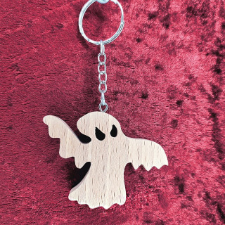Voici un joli porte-clés d’un fantôme sympa en bois noble