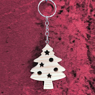 Voici un joli porte-clés d’un sapin de noël en bois noble